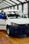 Poznan, Poland - February, 4th, 2015: Cars production line in Volkswagen factory in Poland. The Assembly Plant produces the Caddy and Transporter models. The manufacturing line was adapted for an annual capacity of 180 000 cars.